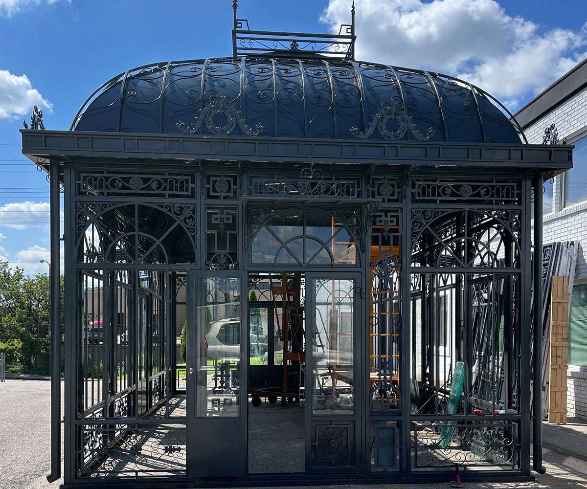 large black iron victorian greenhouse