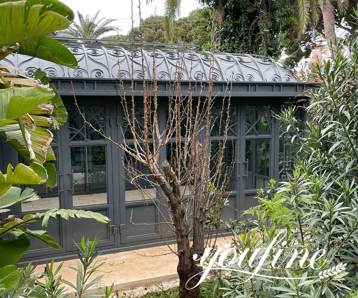 black glass greenhouse