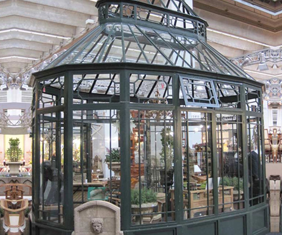 large backyard iron greenhouse