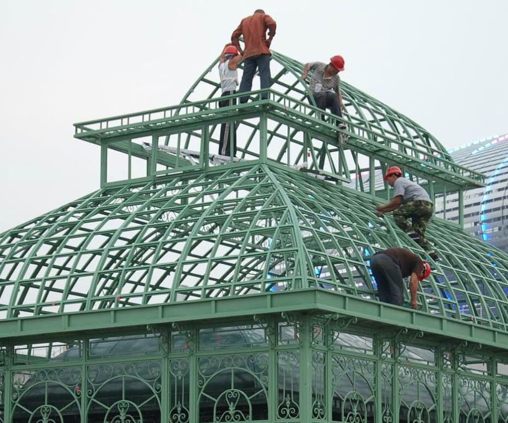 large glass greenhouse installation