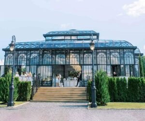 large outdoor custom iron greenhouse