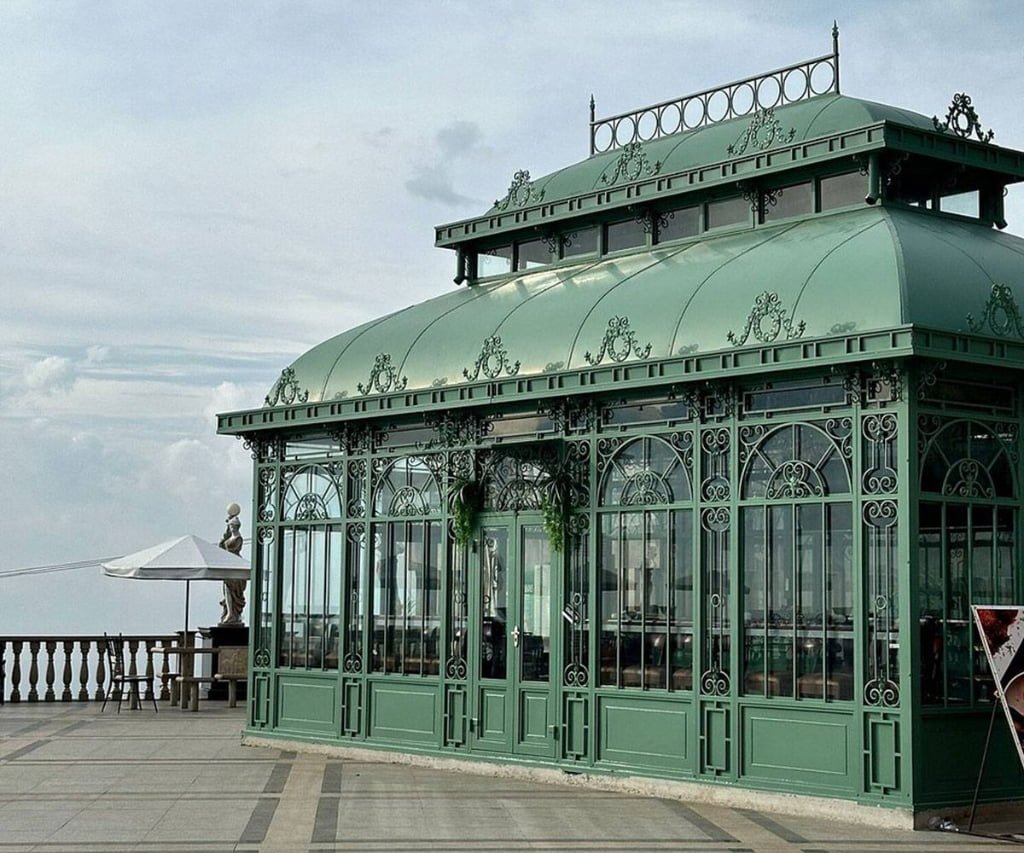 victorian style iron greenhouse