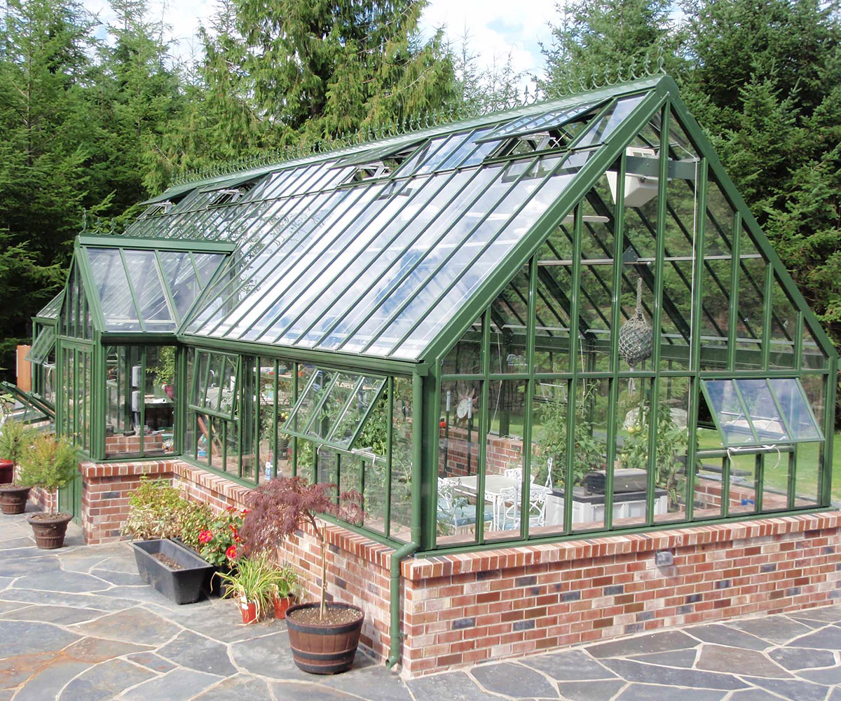 wrought iron victorian brick greenhouse