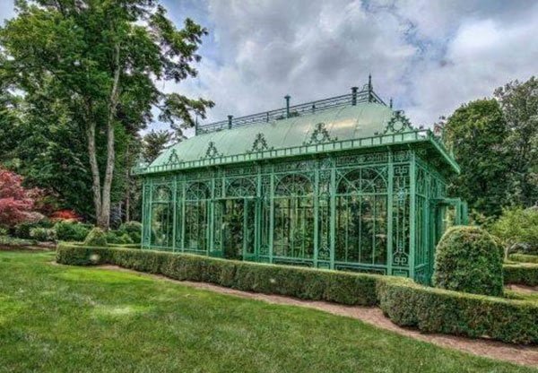 Four-season relaxation room conservatory with cozy furniture