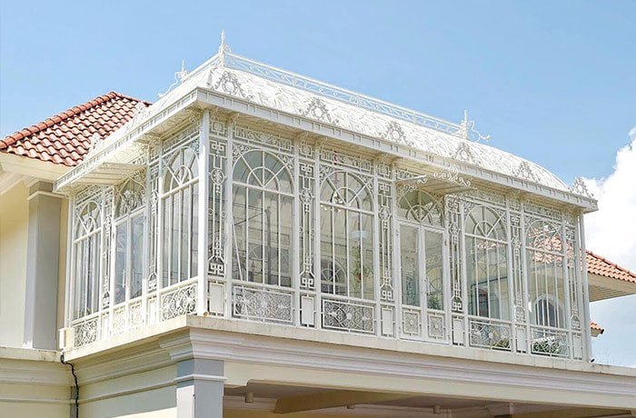 Lean-to greenhouse attached to building
