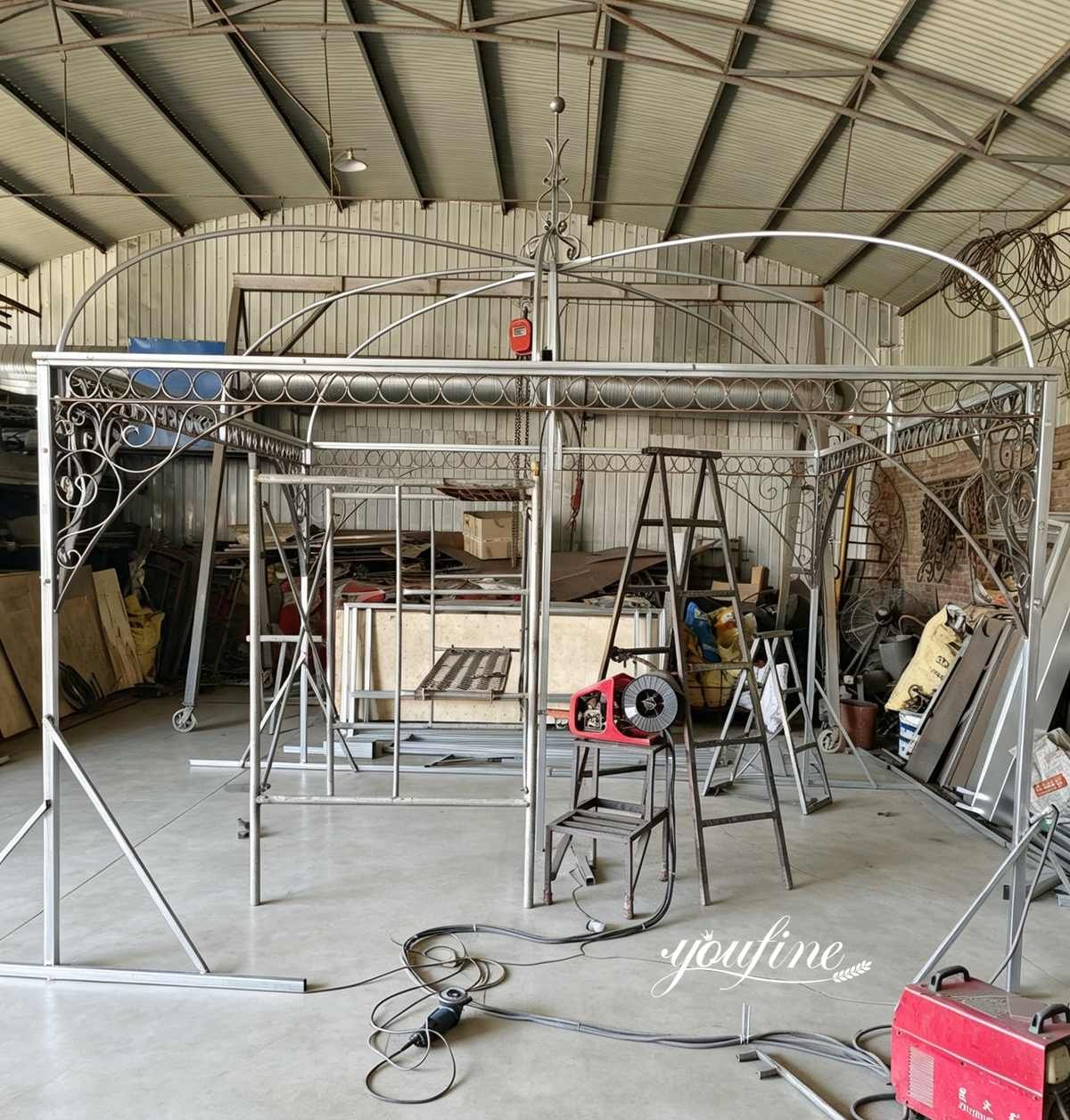 black metal garden gazebo before painting